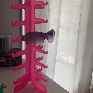 pink eye glasses stand